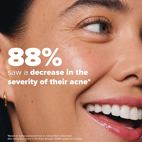 Image 2 - A close-up image of a smiling person with clear skin, featuring the text 88% saw a decrease in the severity of their acne*; based on self-assessments from an independent clinical trial after using all products in the Extra Strength CLEAR system for 4 weeks.
Image 3 - A bottle of Paulas Choice Pore Normalizing Cleanser is shown against a light blue background, with text highlighting its ingredients: Glycerine, which helps retain moisture and instantly plumps skin, and Salicylic acid, which restores moisture barrier and strengthens skins surface.
Image 4 - A blue bottle of Paulas Choice Clear Cleanser is tilted on a bright blue background, with text above reading Skin Concerns and icons for Clogged Pores, Blackheads, and Breakouts.
Image 5 - An image of a persons hand holding a liquid product that is dripping onto their fingers, accompanied by instructions on how to use the product: Apply a small amount to your face using in a circular motion. Rinse well. Repeat as needed for heavy make-up. Use as the first step in your AM and PM routine.