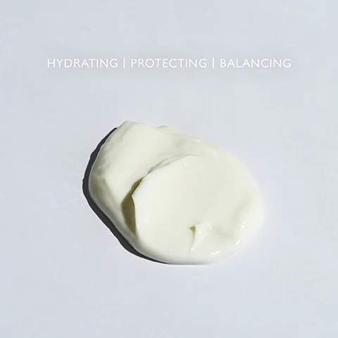 Product swatch on a grey background with the text HYDRATING, PROTECTING, NOURISHING.