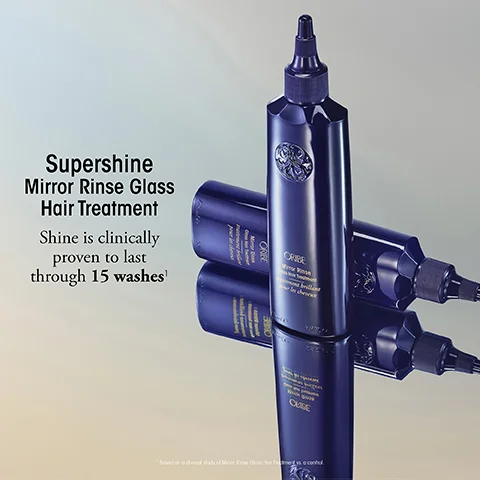 A dark blue Oribe Mirror Rinse bottle is shown with the text Supershine Mirror Rinse Glass Hair Treatment, Shine is clinically proven to last through 15 washes.