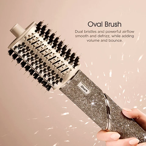 Image 1 - A hand holds a glittery oval brush with dual bristles and a shiny handle, and text reads Oval Brush Dual bristles and powerful airflow smooth and defrizz, while adding volume and bounce.
Image 2 - A hand holding a glamorous paddle brush with a sparkly handle features bristles arranged in rows, and the text reads Paddle Brush Smooth and straighten all at once for a sleek blowout.
Image 3 - A hand holds a sparkling silver hair curler with a spiral barrel, and text above the curler reads Auto-Wrap Curlers Automatically wraps, curls, and sets, for hassle-free curls in seconds.
Image 4 - An image of a sparkling hand-held hair styling tool with a concentrated nozzle, held in a hand, against a soft background, featuring the text Styling Concentrator Dry and style at the same time.
Image 5 - Image shows a hand holding a sparkling silver hair dryer with a curl-defining diffuser attachment, and text reads Curl-Defining Diffuser Fast, even drying from root to tip. Extendable prongs reach roots and add volume to curly hair of any length.
Image 6 - A black storage case with various hair styling accessories such as brushes and rollers is open, with a glittery styling tool visible; the image includes the text Storage Case Included and Fits Shark FlexStyle & five accessories.