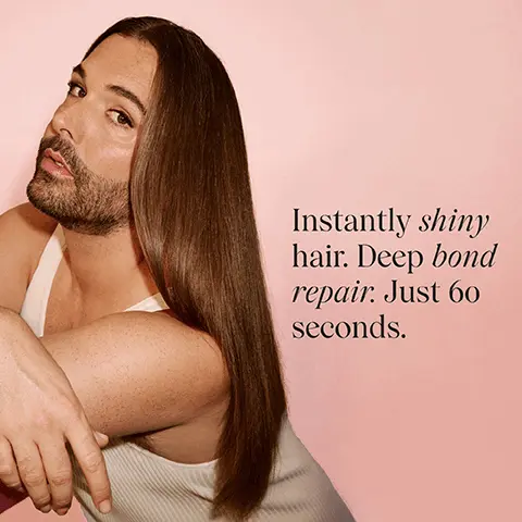 Image 1 - A person with long, shiny hair poses with a slight smile against a pink background, accompanied by the text Instantly shiny hair. Deep bond repair. Just 60 seconds.
Image 2 - Image shows a person holding long, straight blonde hair with text indicating clinical results: 2X reduction in split ends after just one use, 47% reduction in hair breakage, and 81% boost in shine after just one use, with a footnote about clinical assessment.
Image 3 - Image shows a person with long red hair displayed in two sections: the left side shows the hairs texture without the product, appearing frizzy and unruly, while the right side shows the same hair after using Revive Rapid Repair Bond Gloss, appearing smooth and shiny. Visible text includes WITHOUT on the left and WITH: REVIVE RAPID REPAIR BOND GLOSS on the right, along with HAIR NOT RETOUCHED at the bottom.
Image 4 - A comparison image showing two sides of a womans hair: the left side is wavy and frizzy labeled WITHOUT, and the right side is straight and shiny labeled WITH: REVIVE RAPID REPAIR BOND GLOSS, and the bottom notes HAIR NOT RETOUCHED.
Image 5 - A woman with curly hair is shown in a side-by-side comparison; the left side shows her hair without any products, while the right side displays her hair after using Revive Rapid Repair Bond Gloss, with the text WITHOUT on the left and WITH: REVIVE RAPID REPAIR BOND GLOSS on the right, and the note HAIR NOT RETOUCHED at the bottom.
Image 6 - Side-by-side comparison of a models hair, with the left showing the hair without product and the right showing the hair treated with Revive Rapid Repair Bond Gloss, labeled WITHOUT and WITH: REVIVE RAPID REPAIR BOND GLOSS, with the note HAIR NOT RETOUCHED at the bottom.
Image 7 - Infographic titled Hair Bonds 101 explaining what hair bonds are, how they break, and how a product called Rapid Repair Bond Gloss repairs hair bonds, with three key points listed and an image of a pink bottle at the bottom.
Image 8 - A split image showing a woman applying JVN Revive Rapid Repair Bond Gloss to her hair on the left and another woman rinsing her hair on the right, with text that includes two steps for use: Step 1: After shampoo & conditioner, pump generously into hands and fully saturate the hair. Step 2: Leave in for 60 seconds. Rinse. Use 1-2 times per week. PRO TIP: Use a wide tooth comb after application to ensure even distribution.
Image 9 - A pink bottle of JVN Revive Rapid Repair Bond Gloss surrounded by green seaweed, rice grains, and a piece of aloe vera, with text detailing ingredients like Pro-Plex and Hemisqualane that promote hair health and shine.