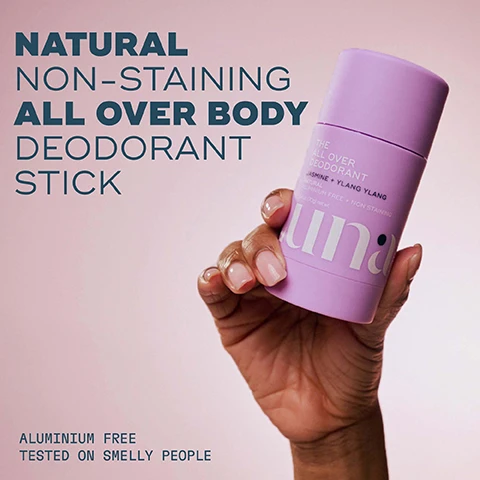 Image 1 - A hand is holding a purple deodorant stick with labels reading NATURAL NON-STAINING ALL OVER BODY DEODORANT STICK and ALUMINIUM FREE TESTED ON SMELLY PEOPLE.
Image 2 - A smiling person with short blonde hair is applying a pastel purple deodorant stick under their arm, with text on the image stating unique gel texture, smooth-glide application, non-staining on light + dark clothes, aluminum-free, and pH-balancing.
Image 3 - A hand holds a lavender stick of all-over deodorant against a partially visible tan skin background, with text that reads: Because sweat doesnt just happen in your armpits, THE ALL OVER DEODORANT, JASMINE & YLANG-YLANG, SLICKENS & SOFTENS DRY SKIN, SOOTHES & REDUCES CHAFING.
Image 4 - A close-up shot of two legs, one being applied with a deodorant stick while the other shows a tattoo, with text that reads GLIDE ON EVERYWHERE: armpits, between legs, lower back, under boobs.
Image 5 - Image shows a promotional graphic for a natural deodorant featuring text that reads Natural deodorant that actually works, along with three circles containing information about ingredients: DEO-PLEX®: To neutralise body odour, Hyaluronic acid and prebiotics: For deep hydration and to balance the skins microbiome, and SYMDEO®: To inhibit the activity of odour-causing bacteria.
Image 6 - An artistic image of a purple deodorant stick labeled THE ALL OVER DEODORANT JASMINE + YLANG YLANG surrounded by splashes of water and white jasmine flowers, with visible text that reads LONG LASTING SCENT and FRESH JASMINE & YLANG YLANG.
Image 7 - A close-up of a persons skin with two purple products labeled THE EVERYWHERE SPRAY-TO-WIPE and THE ALL OVER DEODORANT with text that reads Spray, Wipe and Deo! and The Perfect Pair in a green circle; the spray bottle is for refreshing and cleansing skin on the go, and the deodorant is for natural, non-staining odor defense.
Image 8 - A woman in a light bra applies a purple deodorant stick to her thigh, with the text THE ALL OVER DEODORANT™ and NEW! displayed prominently on the image.