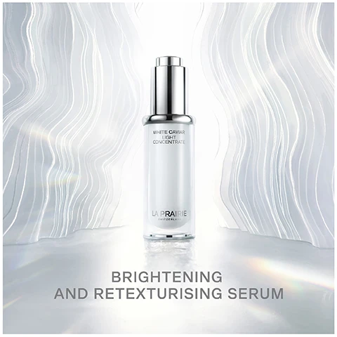 Image 1 - A sleek bottle of La Prairies White Caviar Light Concentrate serum is centered against a soft, wavy, silver background, with the text BRIGHTENING AND RETEXTURISING SERUM below.
Image 2 - A circular, glossy bubble with a light background shows the text INFUSED WITH CAVIAR MICRO-NUTRIENTS AND LUMIDOSE™.
Image 3 - A person with long dark hair applies a dropper of gel to their cheek, with the text LIGHTWEIGHT LUMINESCENT GEL displayed above.
Image 4 - Image shows three skincare products from La Prairie arranged in a row on a light background, with text that reads YOUR WHITE CAVIAR BRIGHTENING ROUTINE above the products, and numbered labels for each: 1. RETEXTURIZE Light Concentrate, 2. ILLUMINATE Pearl Infusion, and 3. MOISTURIZE Crème Extraordinaire.