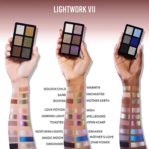 Image 1 - Three hands with different skin tones hold separate six-pan eyeshadow palettes, displaying swatches of various shimmery and matte shades on their forearms, with the text LIGHTWORK VII, GOLDEN CHILD, SAND, ROOTED, LOVE POTION, GUIDING LIGHT, TOASTED, NORTHERN LIGHTS, MAGIC MOON, GROUNDED, WARMTH, ENCHANTED, MOTHER EARTH, WISH, SPELLBOUND, OPEN HEART, DREAMER, MOTHERS LOVE, STAR POWER. Image 10 - A split image shows a models face with a soft smoky eyeshadow look on the left and a bold vibrant shimmering eyeshadow look on the right, with two eyeshadow palettes in the foreground. ONE PALETTE LIMITLESS LOOKS, SOFT, BOLD. Image 2 - The image displays a grid of makeup swatches categorized by finish, featuring 10 Groundbreaking Finishes Texture Deep Dive. Categories and colors include Hypershine Chrome Metallics: Spellbound, Enchanted; Hypershine Metallics: Mothers Love, Star Power; Velvet Metallics: Northern Lights; Velvet Chromes: Mother Earth; Foil Flakes Chromes: Open Heart; Foil Flakes Metallics: Guiding Light; Elastin Multichromes: Golden Child, Love Potion; Chrome Toppers: Dreamer; Elastin Sheer Metallics: Warmth, Wish; and Soft Touch Mattes / Color Accurate Mattes: Sand, Rooted, Magic Moon, Grounded, Toasted. Image 3 - The image illustrates the features of a Danessa Myricks Beauty Lightwork Volume VII Freedom Palette, a fully magnetic eyeshadow palette with a removable mirror and mini palette cover, demonstrating three unique color stories, the ability to pack up and stack the fully magnetic palette to take it to go and put it into an enclosed palette to go bag, and how to customize your own color stories, all under the title Unlock the power of infinite possibilities. Image 4 - Two women, one with dark skin and dark hair and another with red hair, are shown with a makeup brush and an open makeup palette featuring 18 colorful shades, alongside product details that read PATENT PENDING PALETTE DESIGN, FULLY MAGNETIC, CUSTOMIZABLE, STACKABLE AND COLLECTIBLE ON-THE-GO ALL OVER FACE PALETTE, 18 INFINITELY WEARABLE SHADES FOR EYES, FACE & LIPS*, 10 GROUNDBREAKING FINISHES FOR ALL, 3 CURATED MINI PALETTES, FINGER FORWARD FORMULA, BRUSH OPTIONAL, DESIGNED FOR ALL SKIN LEVELS AND ALL MAKEUP STYLES. Image 5 - An image shows two women with shimmering purple and gold eyeshadow, alongside five labeled eyeshadow swatches: Toasted, Grounded, Spellbound, Open Heart, Guiding Light, and the text Get The Look. Image 6 - A close-up of two dark-skinned models wearing golden eyeshadow, with a gold swatch labeled WARMTH and a purple swatch labeled WISH, and text that reads GET THE LOOK. Image 7 - Two women with vitiligo display makeup looks, alongside five eyeshadow swatches labelled Sand, Toasted, Mother Earth, Wish, and Northern Lights, with the text Get the Look. Image 8 - Two close-up images of a womans face showcase a soft makeup look with pink lips and silver-purple eyeshadow labeled SOFT on the left, and a bold makeup look with matte rose lips and silver-blue eyeliner labeled BOLD on the right, flanking a six-shade eyeshadow palette in blues, silvers, greys, and black, all under the tagline ONE PALETTE LIMITLESS LOOKS. Image 9 - A woman models two different eyeshadow looks, one soft golden-brown and one bold shimmering purple and green, with two eyeshadow palettes shown in the middle; the text reads ONE PALETTE LIMITLESS LOOKS, SOFT, and BOLD.